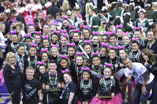 Kentwood High's cheer squads celebrate two titles at the Washington state cheer championships Jan. 26 at Hec Ed Pavilion on the University of Washington campus.