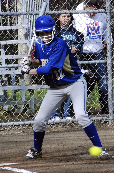Tahoma senior Emily Miller watches a pitch go by during a game Tuesday against Kent-Meridian. Miller hopes to help lead the Bears to their first state berth since the program switched to fastpitch.