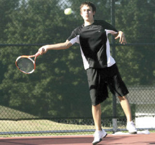 Kentwood singles star Max Manthou took another step Wednesday toward repeating as state champ