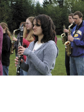 Diana DeFrisco and her Tahoma High bandmates have been practicing for the Maple Valley Days Parade today.