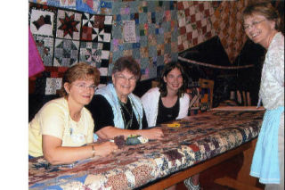 The 105 members of the Covington Quilters Guild include (from left) Mary Ann Baker