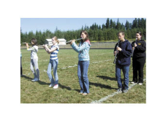 Members of Tahoma High School’s marching band have been practicing their halftime routine after school and on weekends.