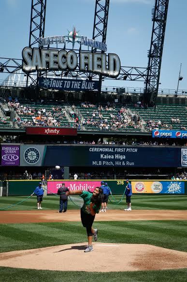 Kalea Higa throws out the first pitch at the Mariners game. Photo courtesy of Ben VanHouten