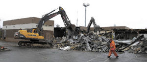 Part of the building that formerly housed the Reporter and other newspapers has been demolished for new businesses.