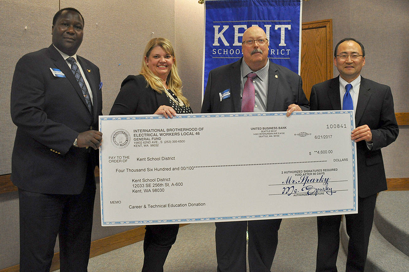 IBEW Local 46 donates $4,600 to Kent School District