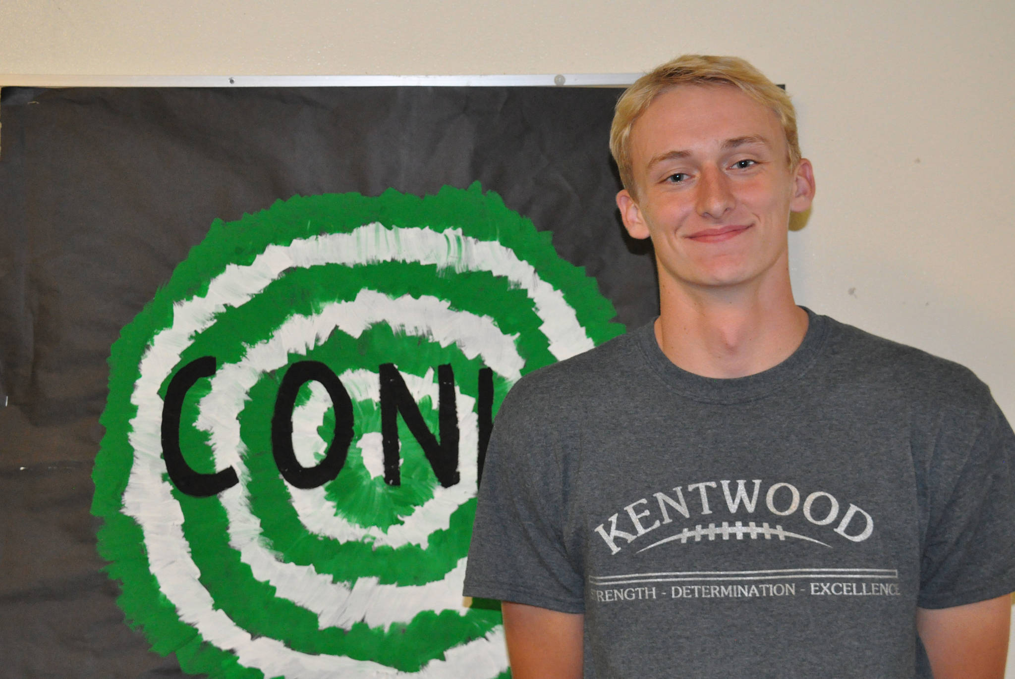 Football all in the family for Kentwood quarterback