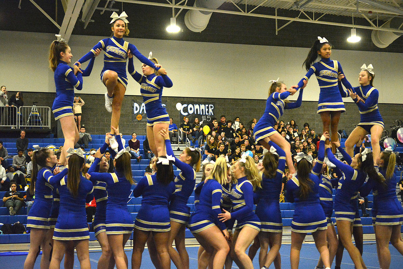 The Tahoma cheerleaders performed at a Tahoma boys basketball game on Jan. 17 at 7 p.m. It was the boys’ senior night as well. Photos by Kayse Angel