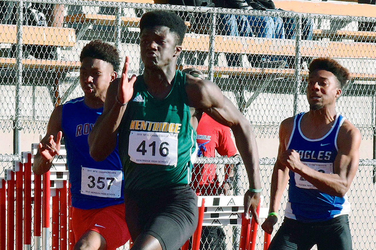 Kentridges Solomon Hines dashes to victory in the 100 meters at 10.87 seconds. RACHEL CIAMPI, Kent Reporter