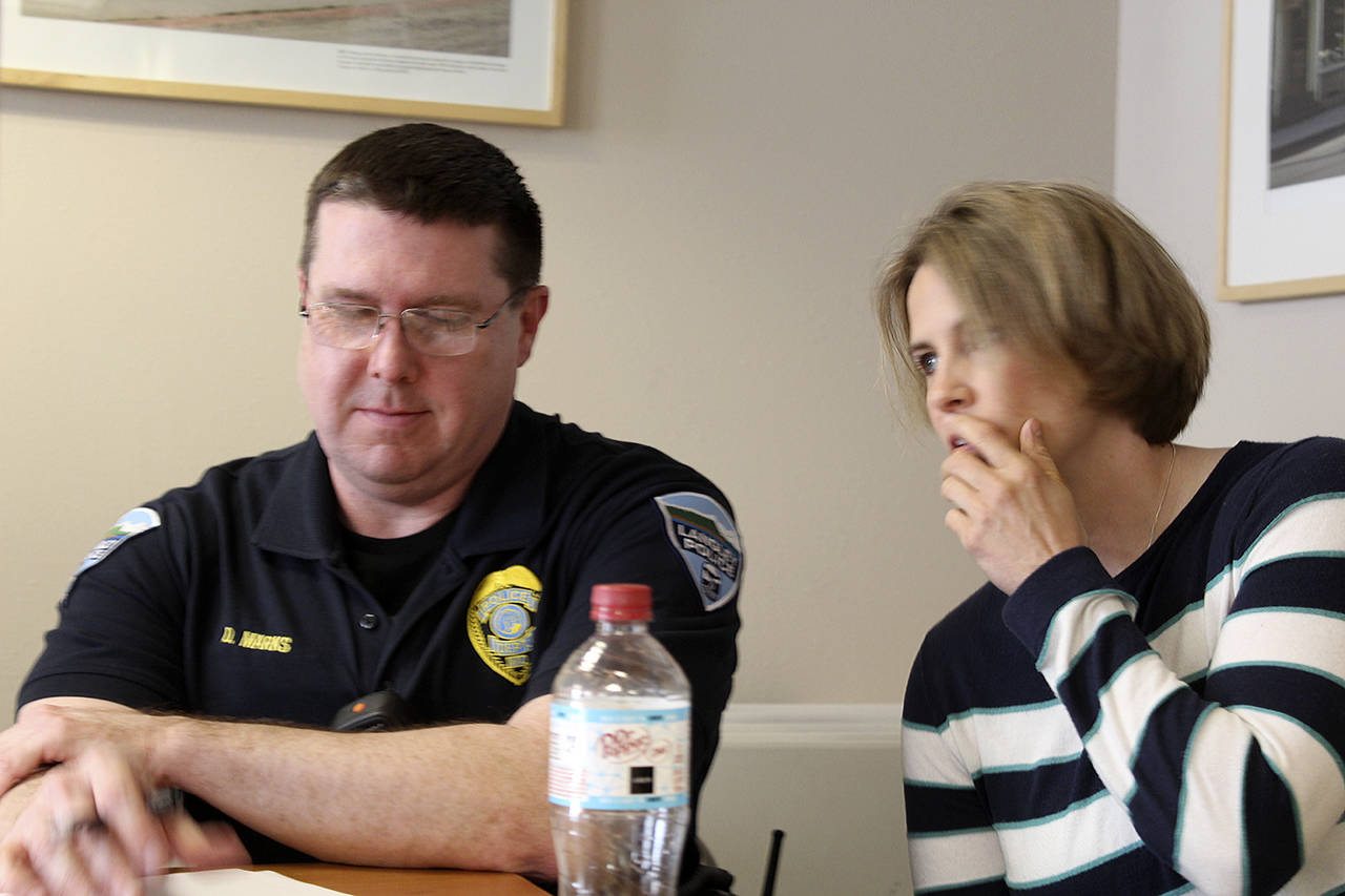 Langley Chief of Police David Marks sat with his girlfriend, Tara Hoflack, during Monday’s city council meeting. Photo by Patricia Guthrie/Whidbey News Group