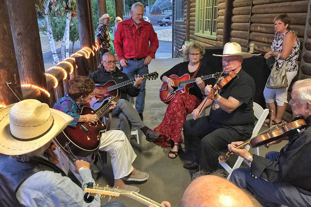 Jam sessions outside the ballroom will be a common sight during the Northwest Western Swing Music Festival, where people can bring their instruments and just join in. Photo by Randy Hill, leader of the western swing band, The Oregon Valley Boys.