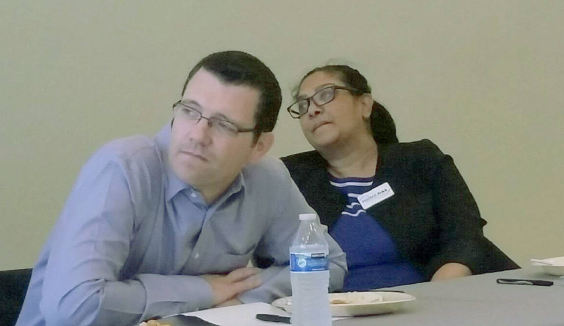 47th Legislative District state Sen. Joe Fain, R-Auburn, and his challenger, Mona Das, D-Covington, listen to other candidates for state office speaking Tuesday afternoon during a forum at the Auburn Community Event Center. ROBERT WHALE, Auburn Reporter