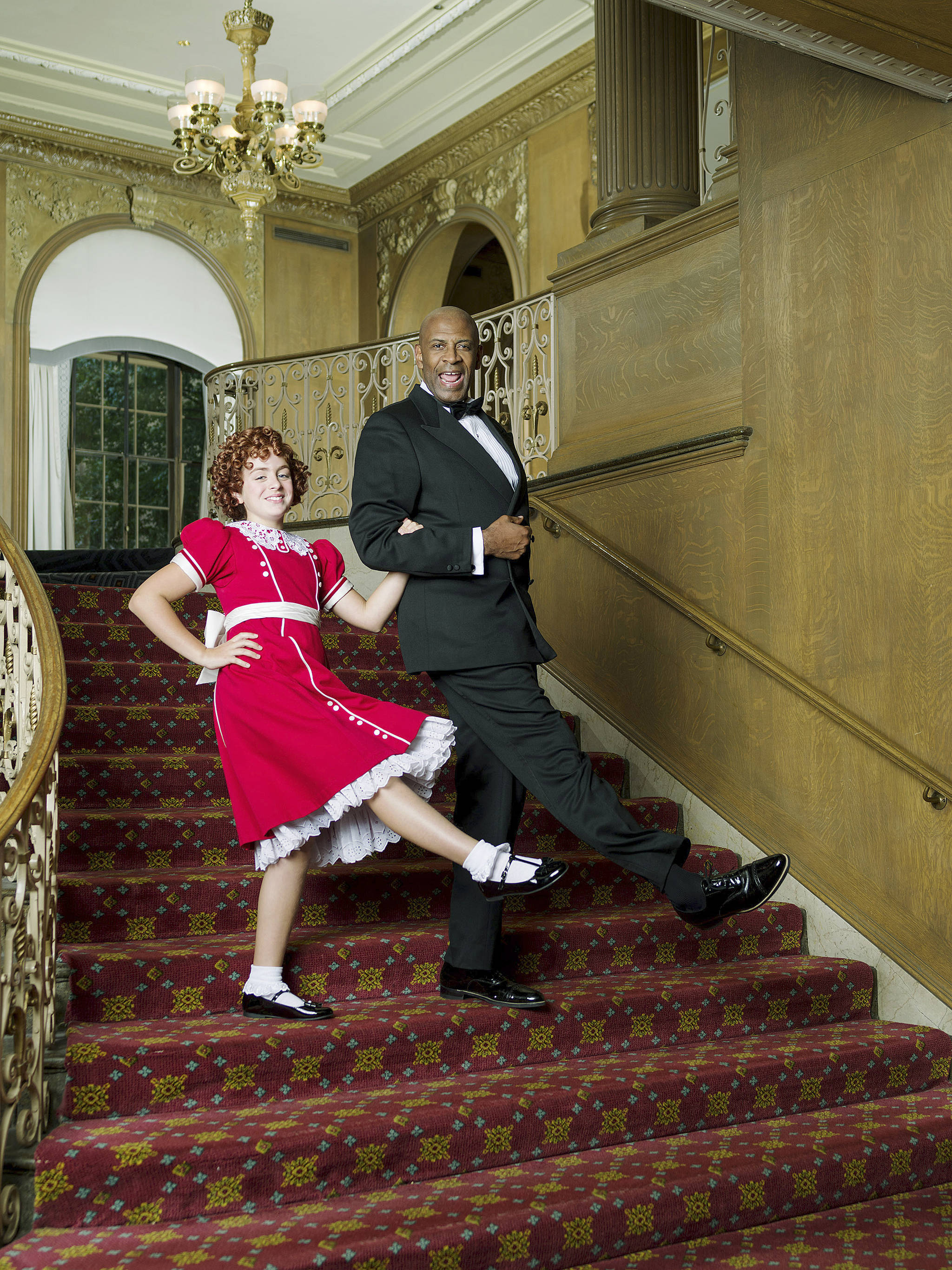 COURTESY PHOTO, Mark Kitaoka                                Faith Young as Annie, with Timothy McCuen Piggee as Daddy Warbucks in the 5th Avenue Theatre’s production of “Annie.”