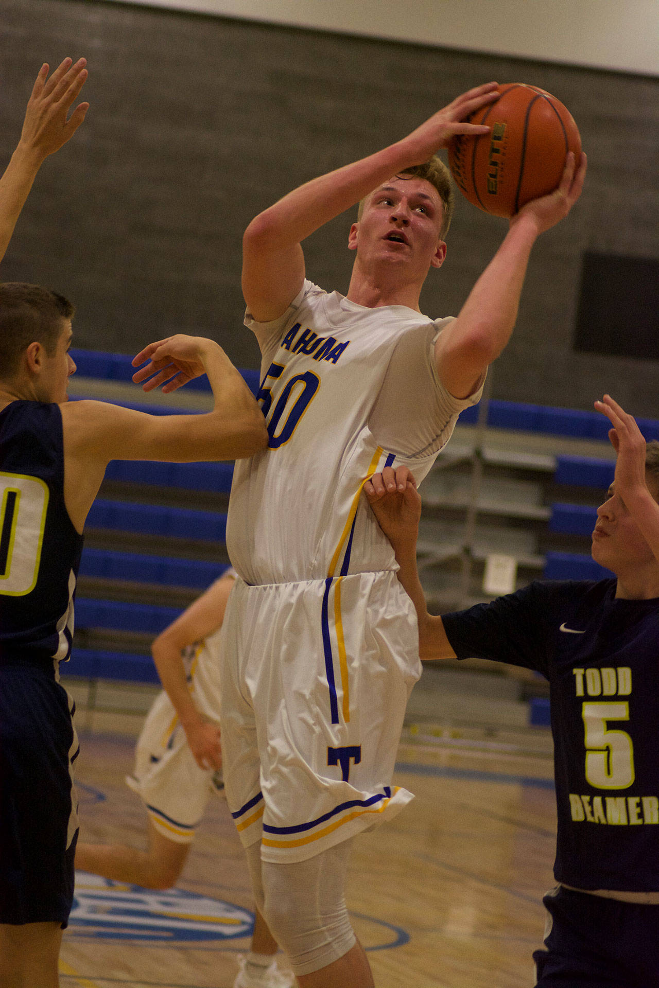 Tahoma senior Kimball Cottam goes up for a shot during Tuesday’s win over Todd Beamer. Photos by Kayse Angel