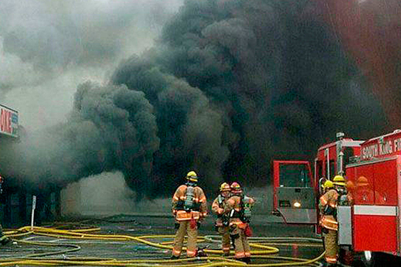Firefighters respond in November 2016 to a strip mall fire on the West Hill in Kent. FILE PHOTO