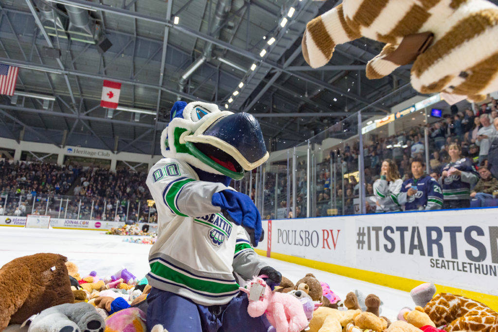 Cool Bird has some fun while gathering the furry donations from the Fred Meyer Teddy Bear Toss Night presented by WARM 106.9 FM. COURTESY PHOTO, Brian Liesse, T-Birds
