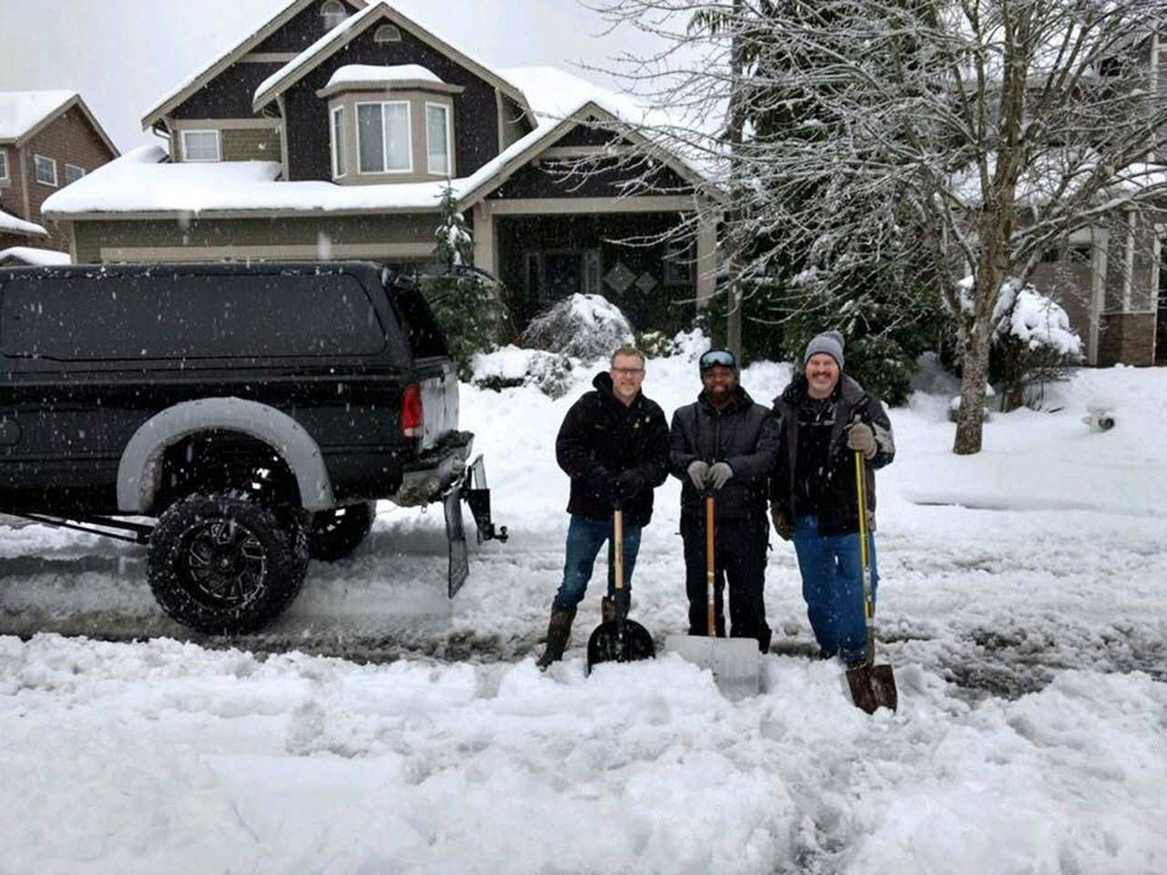 During the recent snow, these three neighbors roamed Valley Meadows looking for people who were stuck in the snow. When William Peterson’s car was snuck in the snow, he said they jumped right out of their truck and started shoveling his car out. Submitted photo from William Peterson
