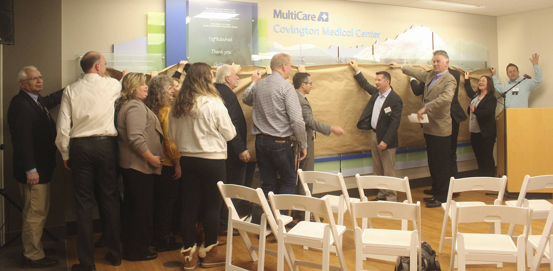 Multicare staff members and others gathered on Feb. 26 to celebrate the unveiling of the new donor wall that honors those who have donated to the South King Health Foundation campaign, which funded a reflection room for Covington MultiCare.