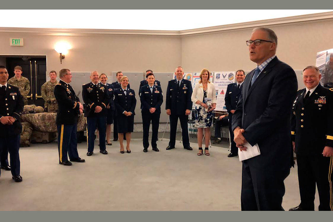 Washington National Guard members were honored by Eastside Fire & Rescue for their work during the February snow storm. The honor was part of the annual National Guard Day March 27 including visiting with Gov. Jay Inslee. Courtesy photo