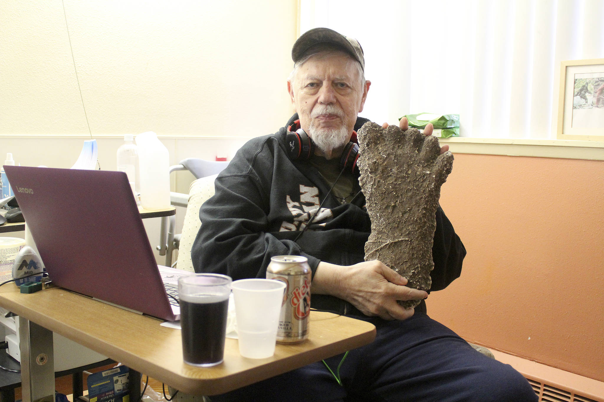 Thom Cantrell, one of the organizers of the upcoming International Conference for Primal People, holds up a mould of a Sasquatch footprint. He said the mould was taken in the Blue Mountains in Oregon by Paul Freeman, a well-known Sasquatch hunter who’s 1994 footage of a Sasquatch in that area made big waves in the believer and skeptic communities alike. Photo by Ray Miller-Still
