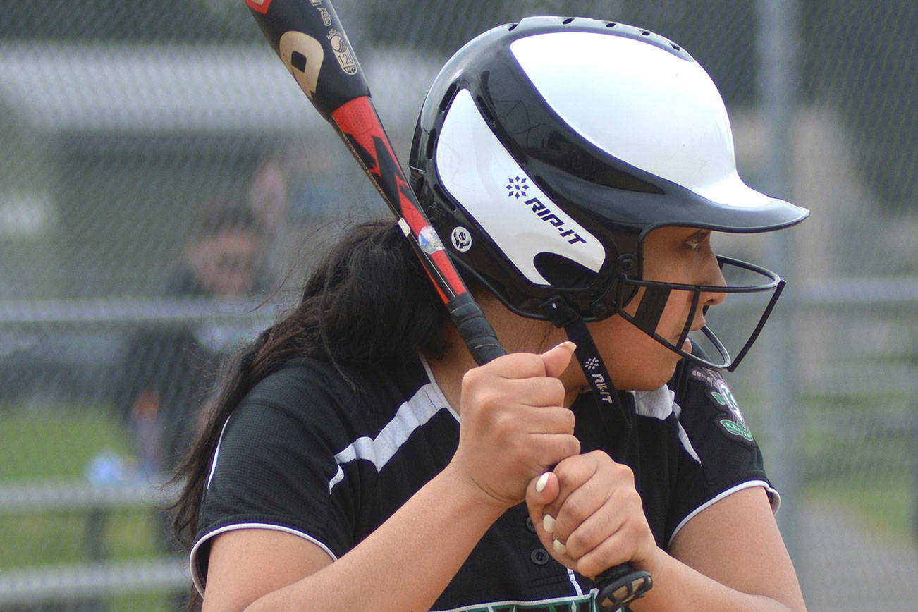 A Kentwood softball player steps up to the plate during the April 25 game against Kentridge.
