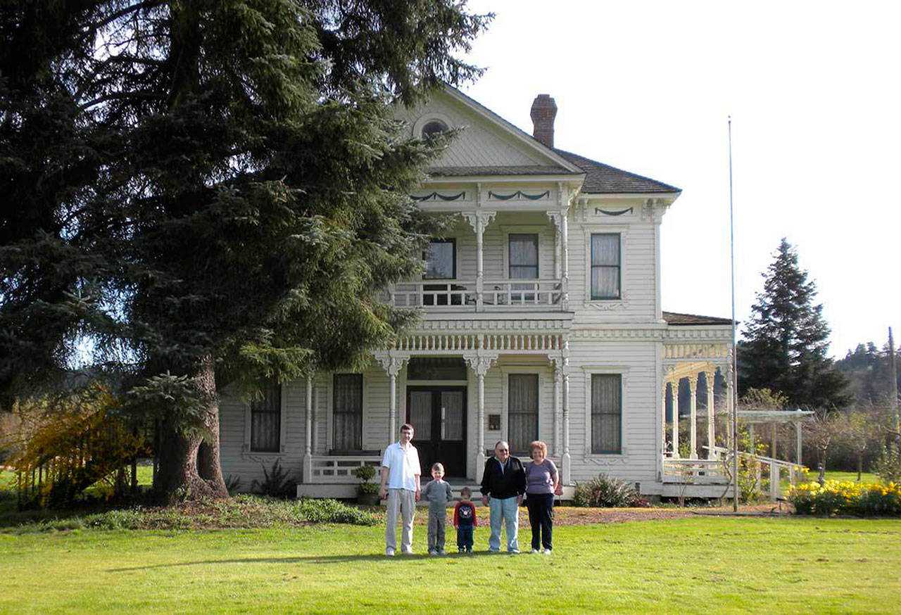 Left to right, Ken Beckman, Aaron Beckman, Grant Beckman, Howard Elliot Neely and Jane Neely Beckman. Howard was the then-93-year-old grandson of Aaron Neely, Sr., who built the house. Photo by Karen Meador