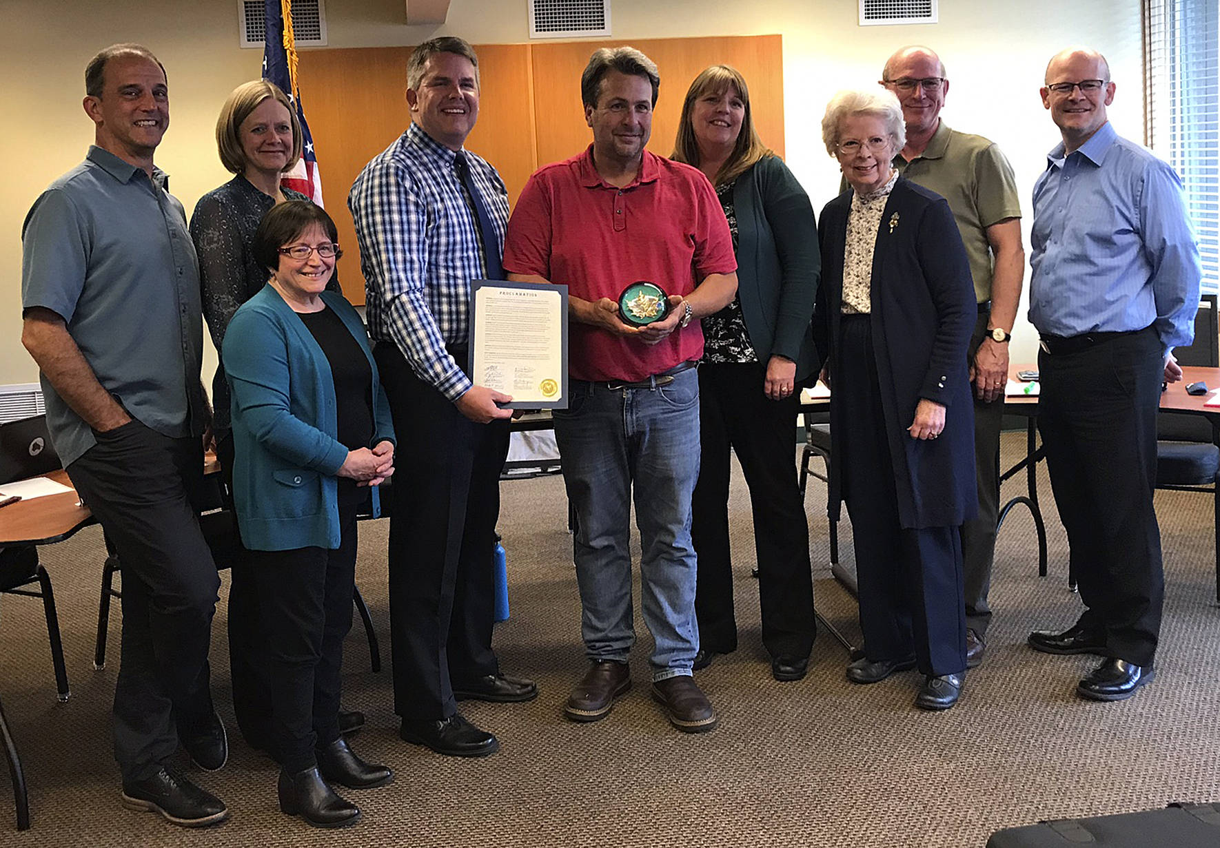 Photo by Kayse Angel                                 Maple Valley community member Brett Habenicht received the Golden Maple Leaf Award during the May 28 Special City Council Meeting.