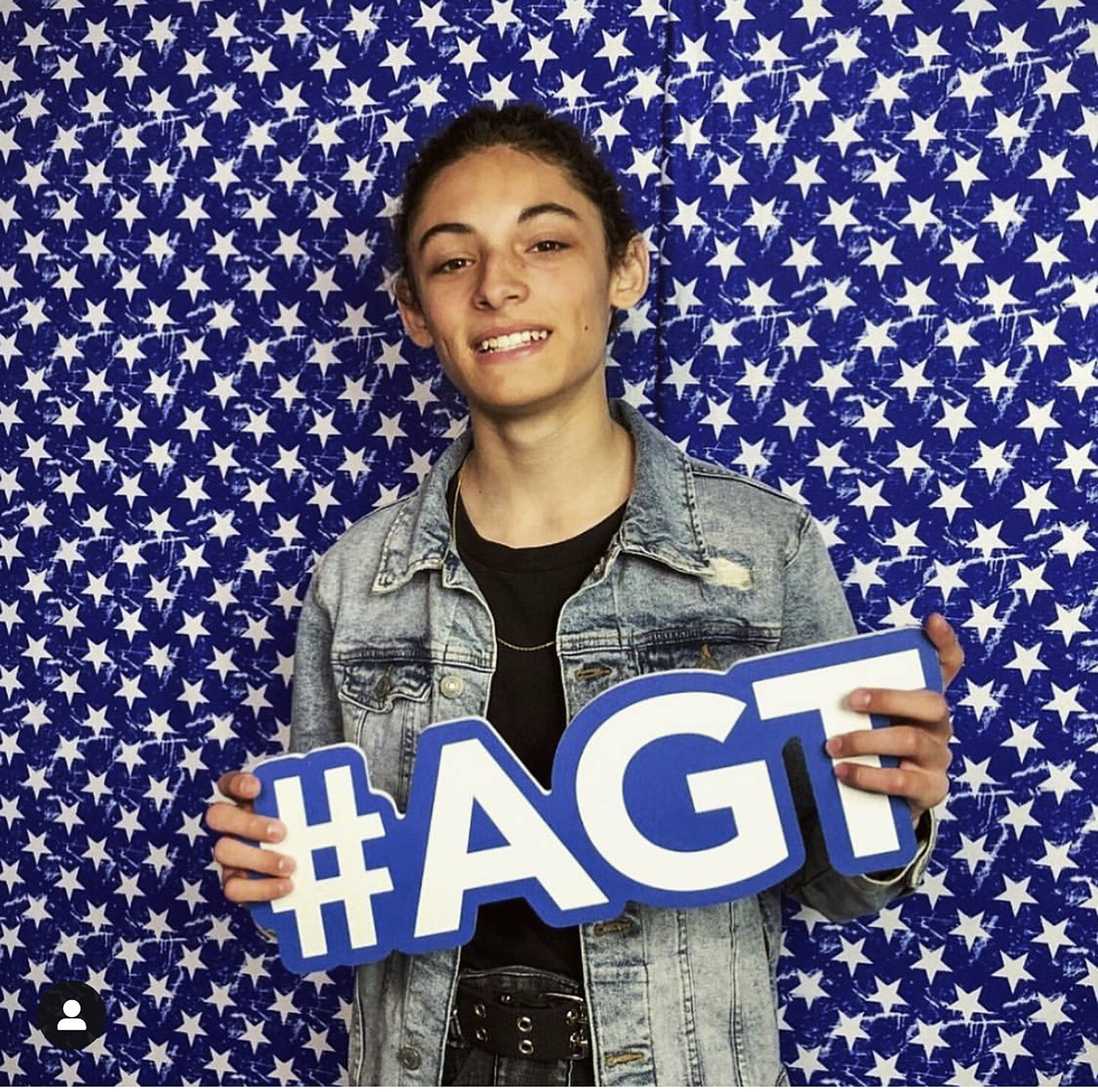 Photo pulled from                                 Bryant’s Instagram                                 Benicio Bryant from Maple Valley holding up an America’s Got Talent hashtag. Bryant’s performance on the show aired June 4.