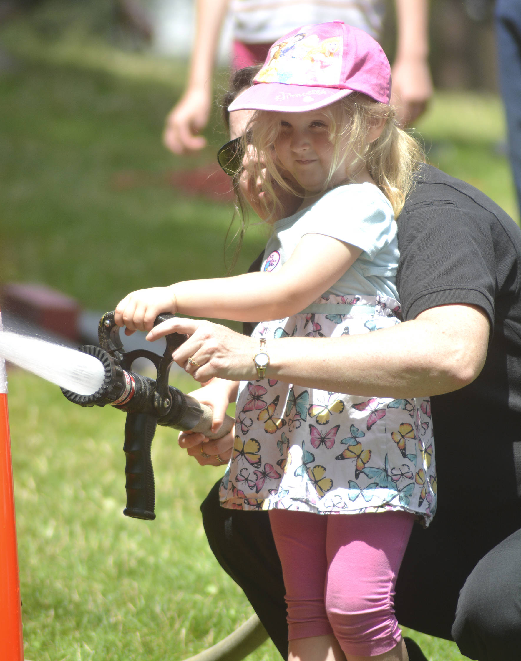 Hazel Erickson completes the Puget Sound Regional Fire Authority’s obstacle course at Maple Valley Kids’ Fest on July 13.