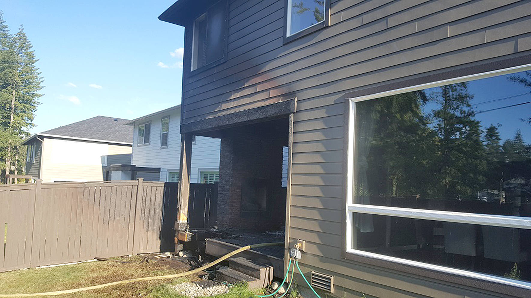 A Maple Valley home was damaged by a deck fire, but a dog was saved thanks to the quick action of local firefighters.                                Photos provided by the Puget Sound Regional Fire Authority