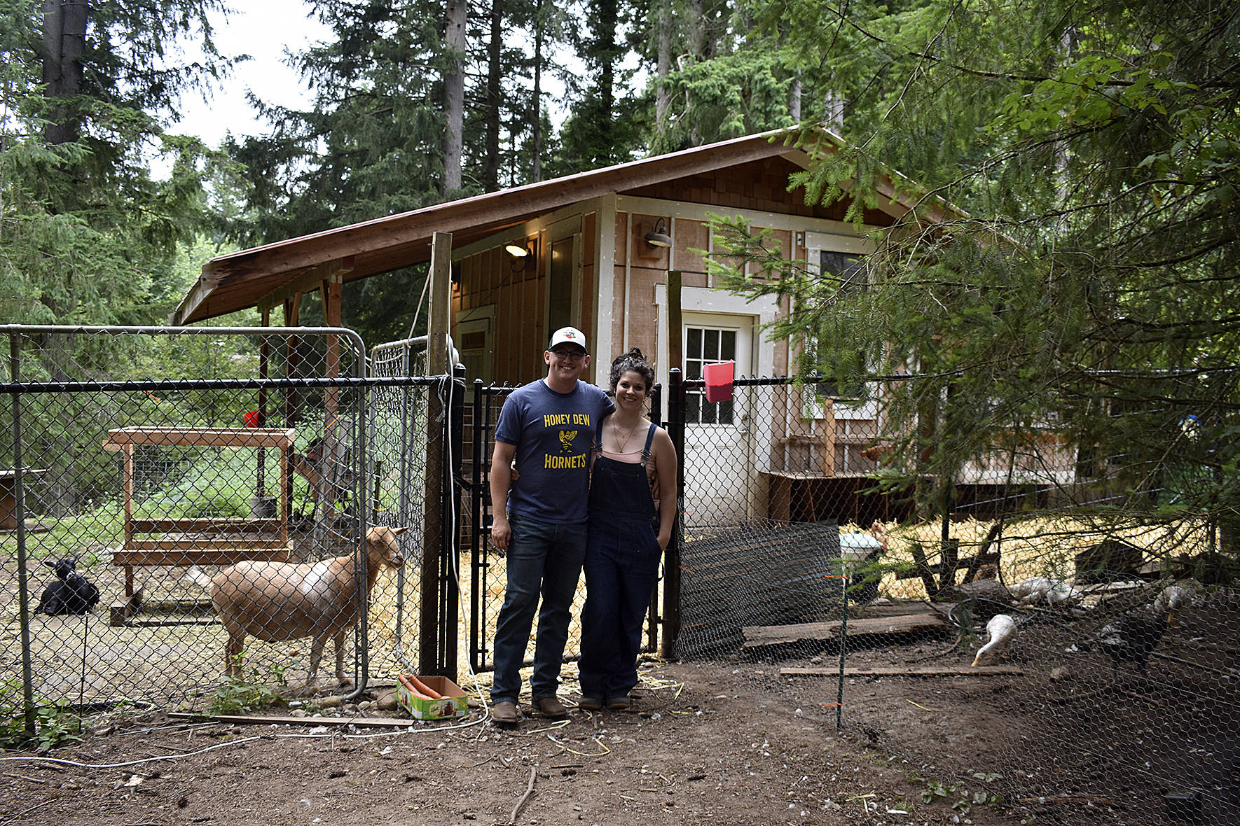 Photos by Haley Ausbun. The BackYardFarm, a local couple trying to help folks with small yards build their own farm, hosted an event July 27, where guests could meet the animals, feed the goats and eat food sourced from their own back yard.