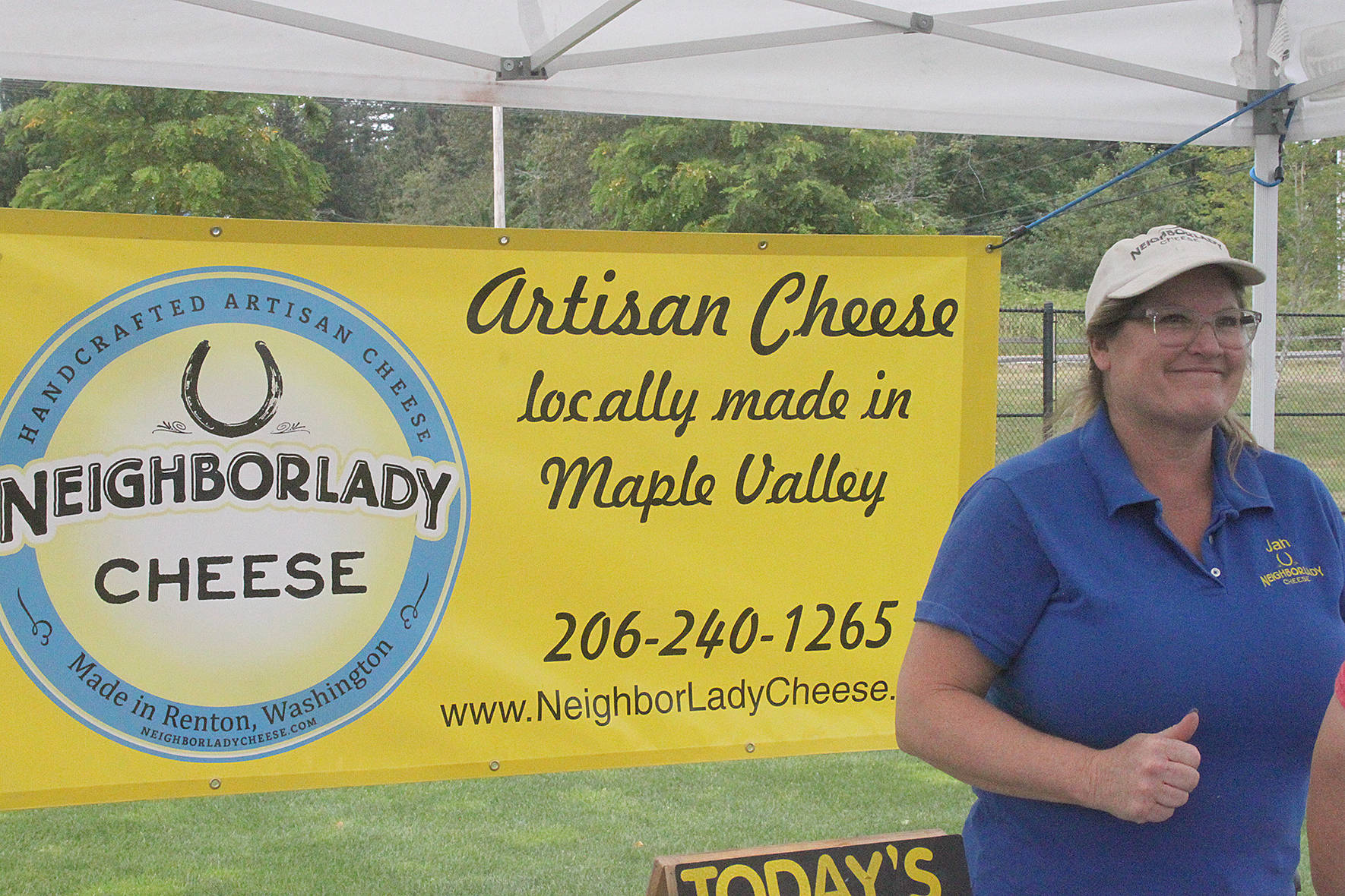 Maple Valley’s artisan cheese vendor, Neighborlady Cheese, handed out samples of ghouda, pepper jack and more at the 2019 Covington Sausage and Cider Fest. Photo by Danielle Chastaine