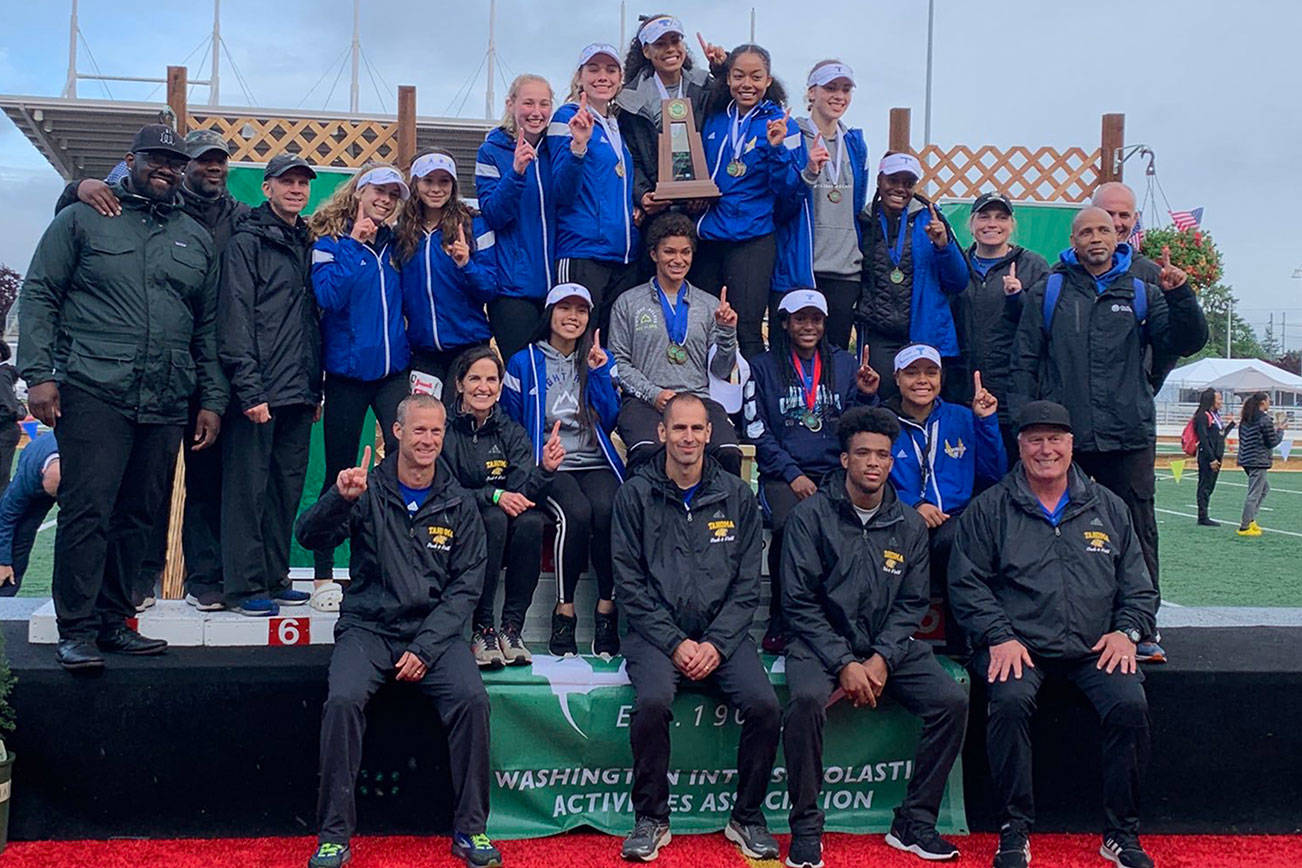 The Tahoma track team, with coach Jeff Brady in the bottom row on the left, after winning the 2019 state championship title.                                 Photo courtesy of Jeff Brady.                                 The entire Tahoma track and field, and cross country coaching staff.                                 Photo courtesy of Jeff Brady.