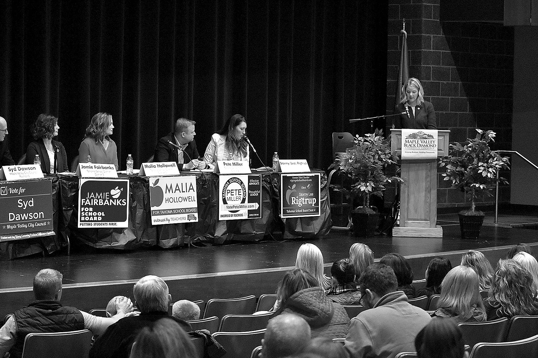  Photo by Haley Ausbun. Forum moderator Grifan Cayse (far right) asks questions to four Tahoma School District board candidates and five Maple Valley city candidates at the Maple Valley candidate forum, hosted by Maple Valley Black Diamond Chamber of Commerce, Thursday, Oct. 17 at Tahoma High School. 
