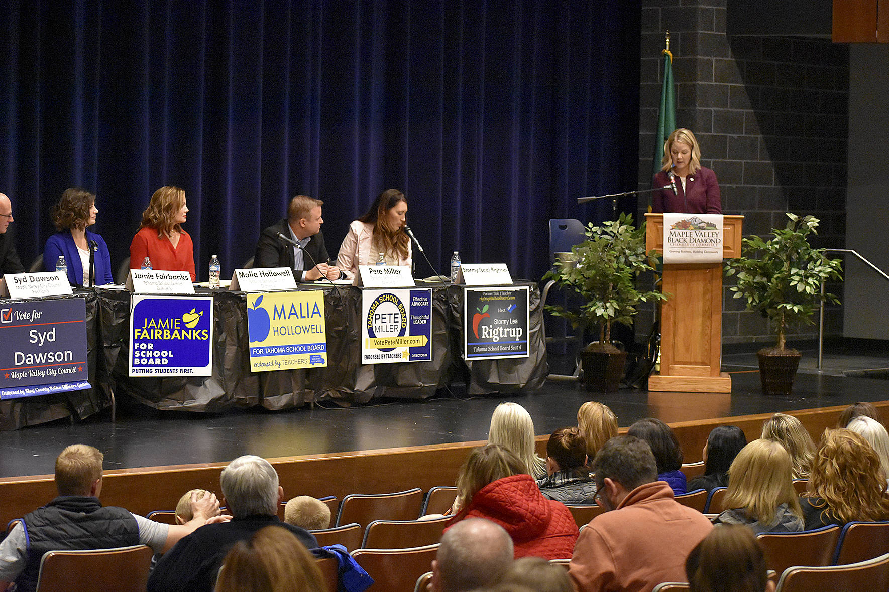  Photo by Haley Ausbun. Forum moderator Grifan Cayse (far right) asks questions to four Tahoma School District board candidates and five Maple Valley city candidates at the Maple Valley candidate forum, hosted by Maple Valley Black Diamond Chamber of Commerce, Thursday, Oct. 17 at Tahoma High School. 