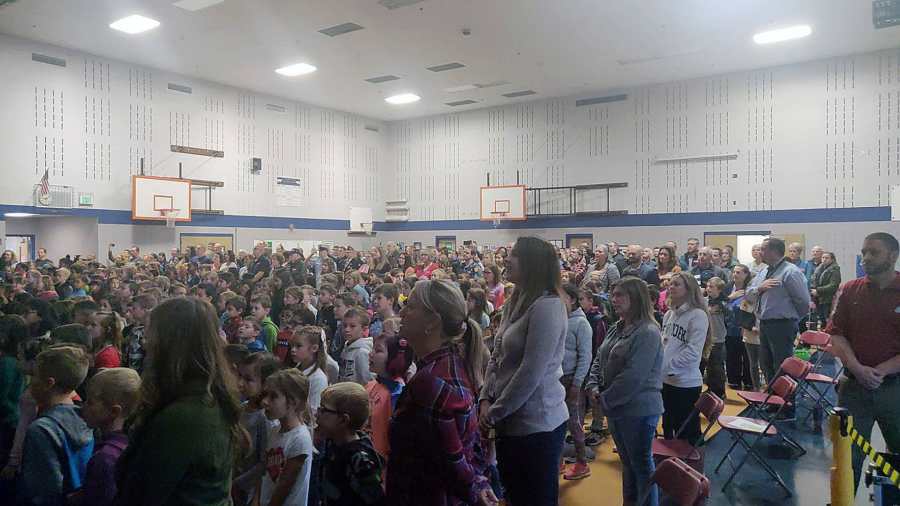 Hundreds of students, veterans and their families crowded into the Glacier Park Elementary School gymnasium for a special Veterans Day Assembly held by the fifth grade class on Friday, Nov. 8. Photo by Danielle Chastaine.                                 Hundreds of students, veterans and their families crowded into the Glacier Park Elementary School gymnasium for a special Veterans Day Assembly held by the fifth grade class on Friday, Nov. 8. Photo by Danielle Chastaine.