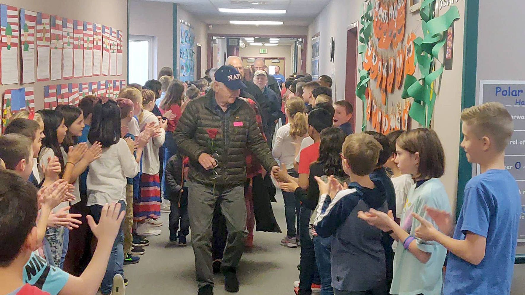 The Glacier Park Elementary School fifth grade class lined the halls after a special Veterans Day assembly to give high fives and applause to veterans, who were led through the halls after being honored by the school on Friday, Nov. 8, 2019. Photo by Danielle Chastaine.                                 The Glacier Park Elementary School fifth grade class lined the halls after a special Veterans Day assembly to give high fives and applause to veterans, who were led through the halls after being honored by the school on Friday, Nov. 8, 2019. Photo by Danielle Chastaine.                                 The Glacier Park Elementary School fifth grade class lined the halls after a special Veterans Day assembly to give high fives and applause to veterans, who were led through the halls after being honored by the school on Friday, Nov. 8, 2019. Photo by Danielle Chastaine.