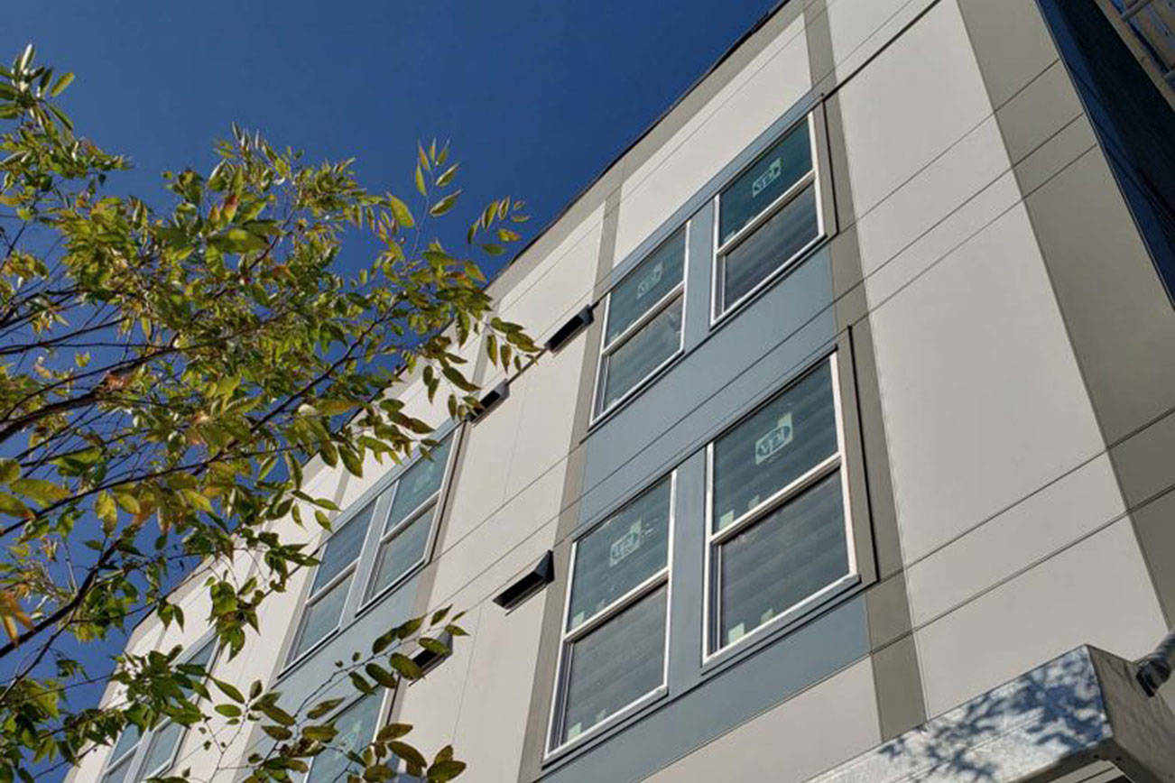 The Valhalla Apartments, located in Tacoma’s Hilltop Neighborhood, were built by Maple Valley-based construction company Sandoval Construction. Owner Alejandro Sandoval has been charged by L&I and owes nearly $100,000 in back wages to employees who worked on the Valhalla project.                                Photo courtesy of Capital Management Advisors.