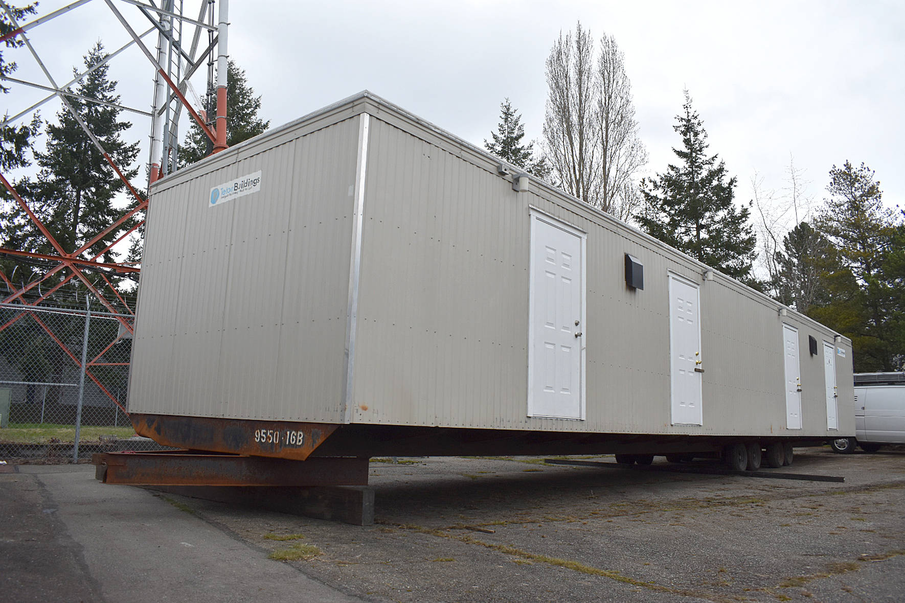 Photo by Haley Ausbun. A preview of the first modular unit being used to house King County residents under quarantine for COVID-19, coronavirus. The units will be located on a county-onward parcel in White Center, where an old office building is planned to be demolished to make space.