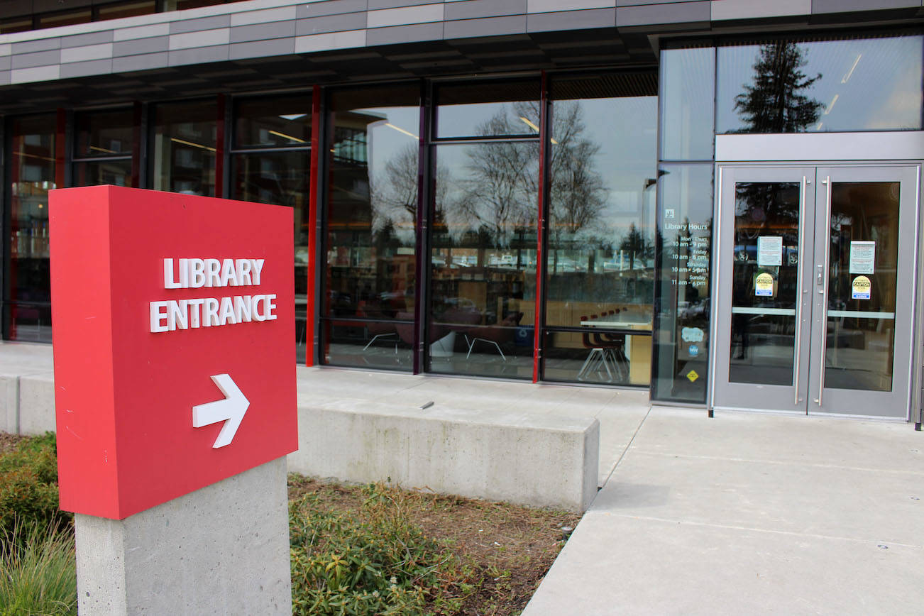 Entrance to the Tukwila Library branch of the King County Library System on March 17. KCLS announced March 13 that it would be closed until April at earliest in response to the coronavirus pandemic. Mitchell Atencio/staff photo