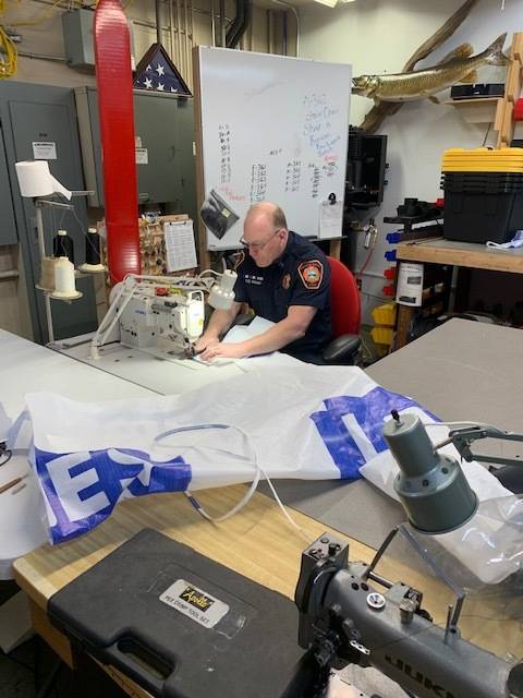 Sewing up solutions: South King firefighter designs prototype for protective gown shortage
