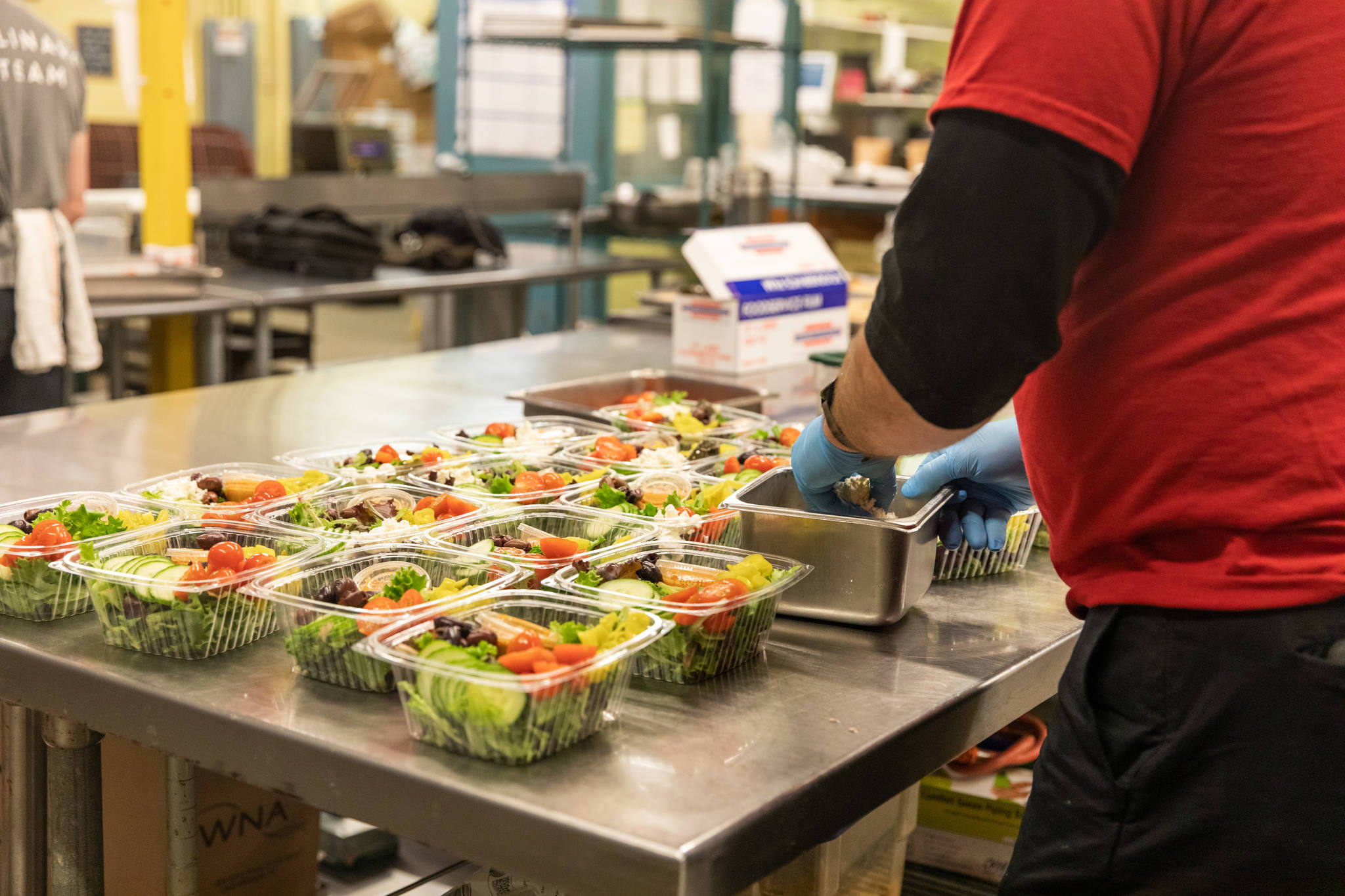 The team at Lisa Dupar Catering has found hearty entree salad and sandwich combinations to be the most effective for the meals they prepare for Medic One Foundation’s Gratitude Meals program. Photo courtesy of Hannah Sheil