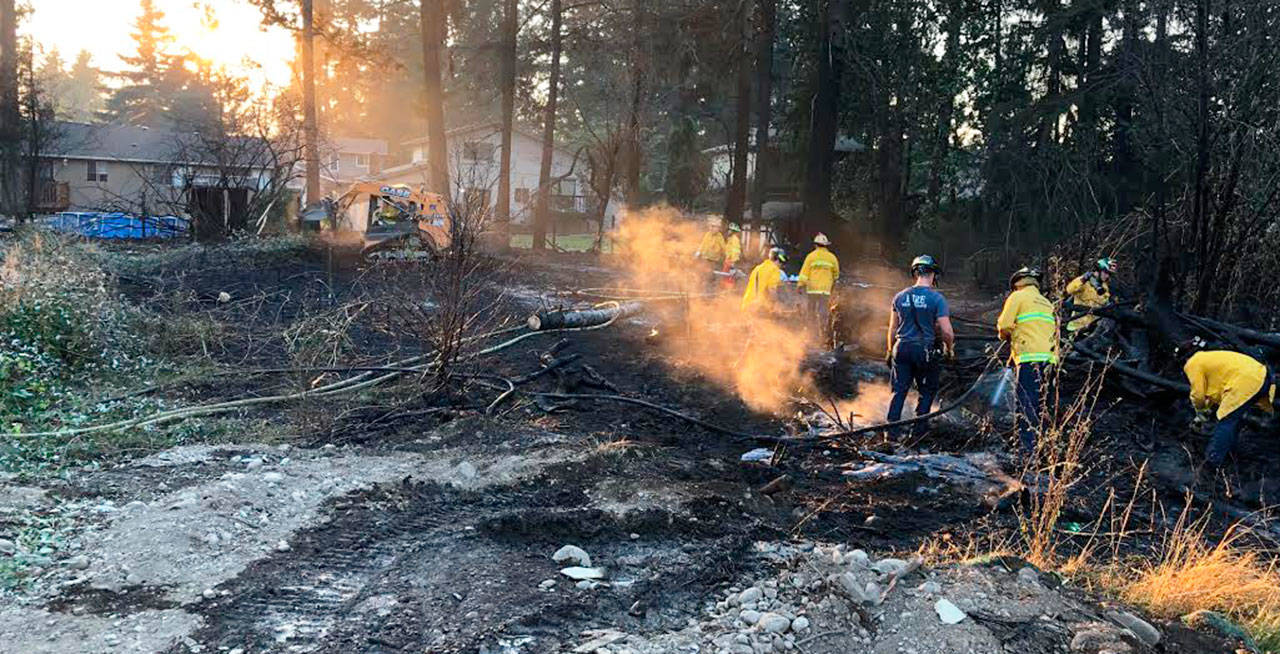 Crews battled a large brush fire Tuesday afternoon, Sept. 8, near the former Covington Elementary School in the 17000 block of Southeast Wax Road in Covington. COURTESY PHOTO, Puget Sound Fire