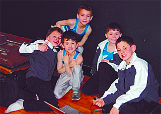 Members of the Summit Gymnastics team at a competition in Portland two weeks ago. In the back is Zach Klobutcher