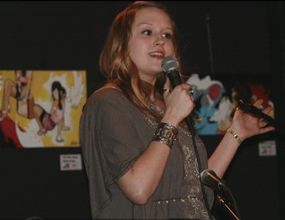 Malorie Spreen recites one of her poems at the Maple Valley Creative Arts Center's Open Mic event Jan. 22.