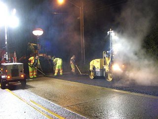 Crews paving SR 169 in Maple Valley with fresh asphalt.
