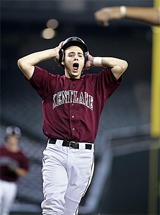 Kentlake’s Bobby Joe Tannehill crosses home plate to score the winning run during last spring’s class 4A state semifinal game against Richland at Safeco Field.