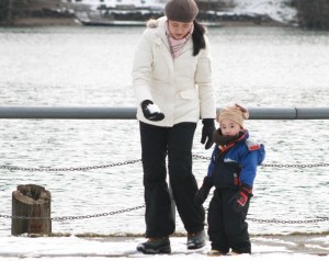 Crystal Ho helps her son Jason