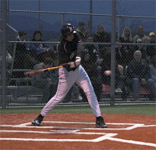Alexander Lee from Kentwood takes a cut at a ball thrown by Tahoma pitcher Chris Marangon.