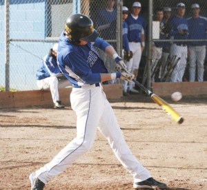 Tahoma's Derek Johnson hit shot during the Bears' 8-5 victory over Kent-Meridian Thursday at home.