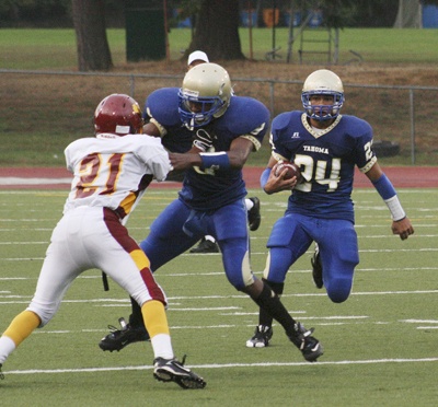 Niko Madison breaks into the open in the game Friday at home against Thomas Jefferson High. Madison scored twice to help the Bears win 26-6.